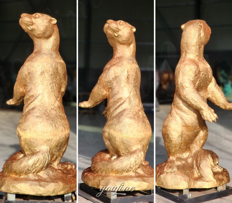 different angle of standing otter sculpture