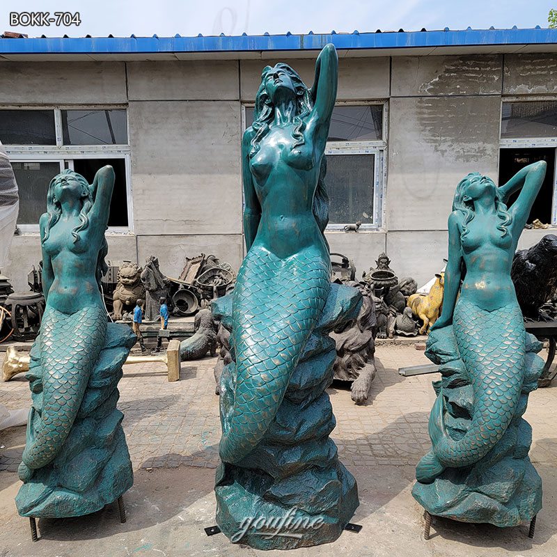 mermaid on a rock statues