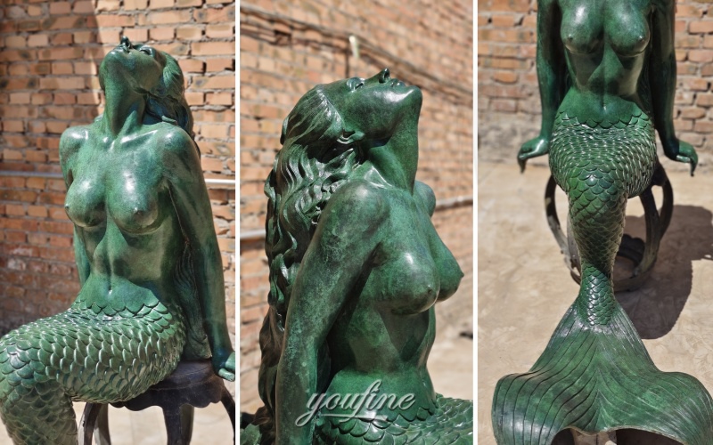 sitting mermaid statue detail