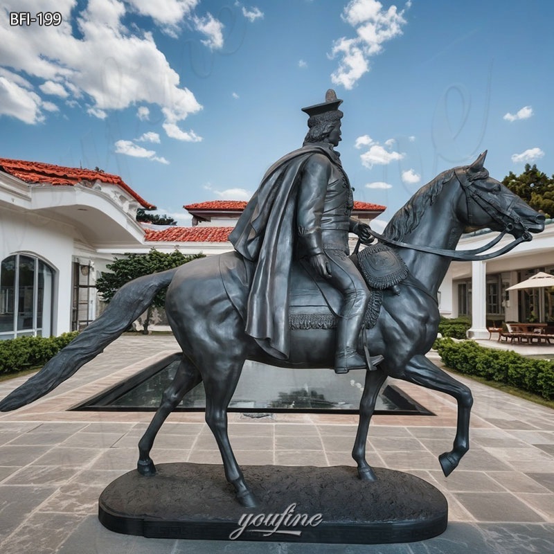 man riding horse sculpture