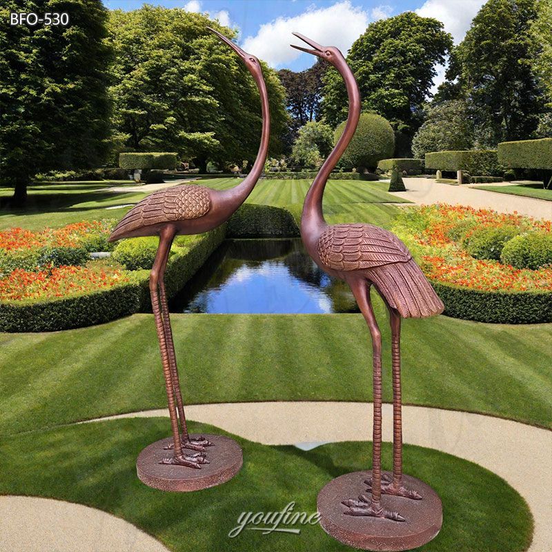 brass heron sculptures