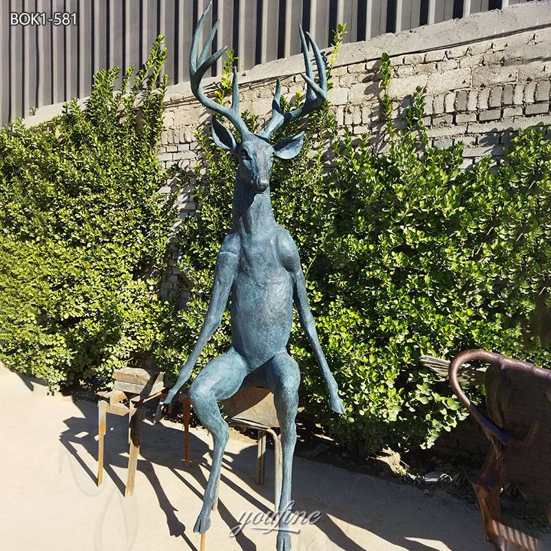 sitting deer sculpture