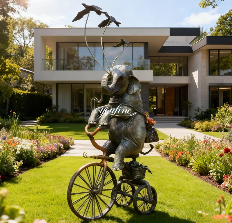 Cute Elephant Sculpture on Bicycle