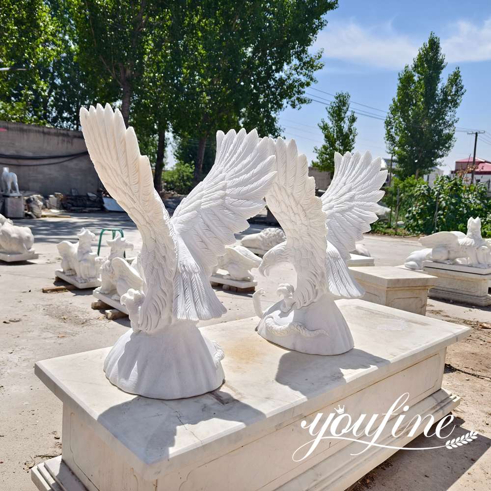 white marble eagle statue side view