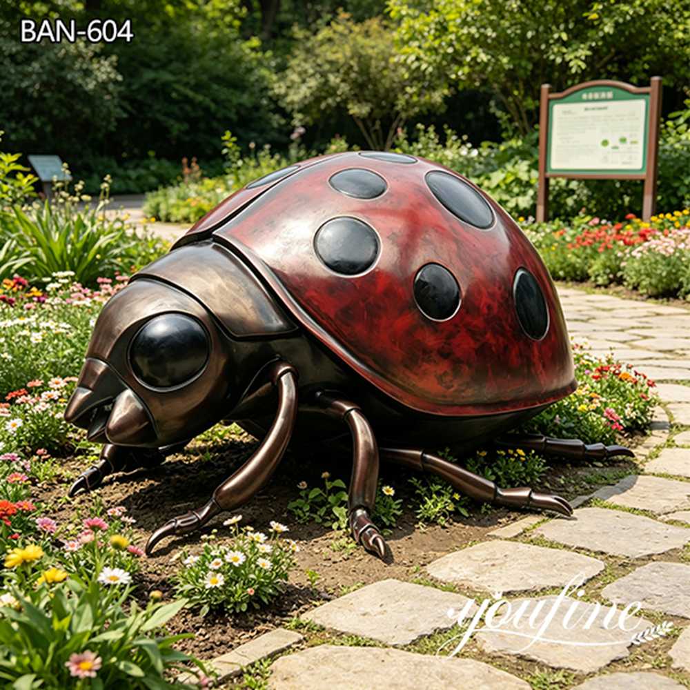 red bronze ladybug sculpture