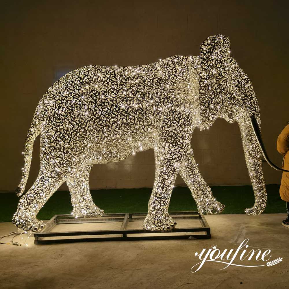 stainless-steel-elephant-sculpture-at-night