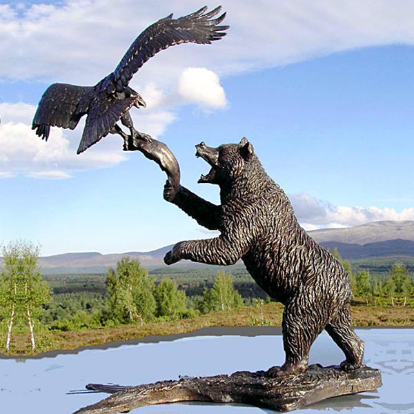 Bronze bear and eagle wildlife sculpture