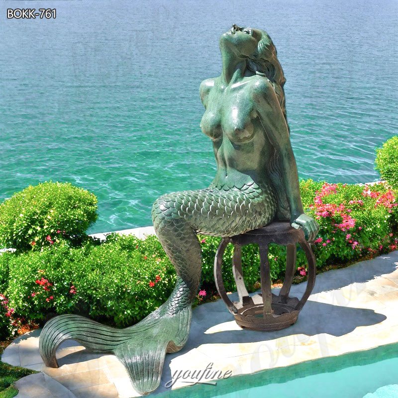 Bronze Sitting Mermaid Statue Bathed in the Sun
