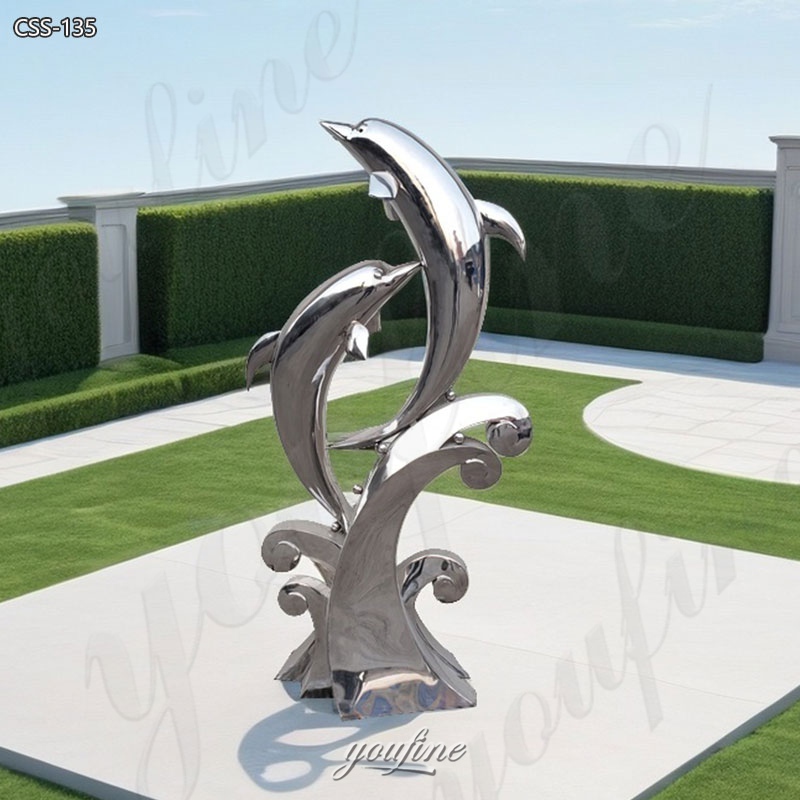 metal dolphin statue