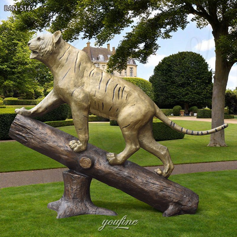 tiger standing on a trunk sculpture
