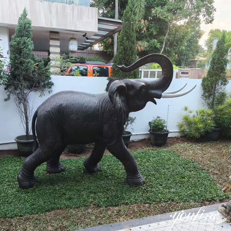 Large bronze elephant statue at entrance